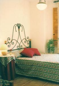Ein Bett oder Betten in einem Zimmer der Unterkunft La Posada Real