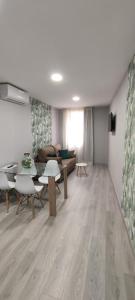 Posedenie v ubytovaní Apartamentos Harmonia
