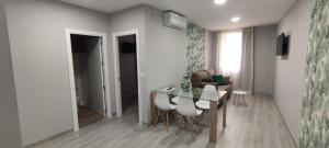 Posedenie v ubytovaní Apartamentos Harmonia