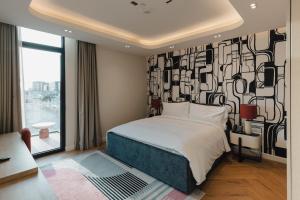 Letto o letti in una camera di The Muse