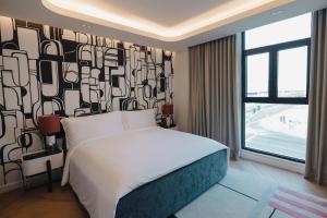 Letto o letti in una camera di The Muse
