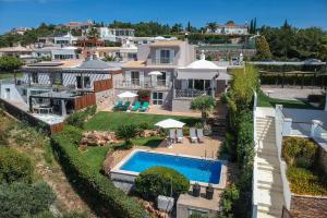 an aerial view of a house with a swimming pool at Villa Vista in Valados