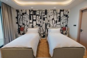 Letto o letti in una camera di The Muse