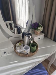 Příslušenství pro přípravu čaje a kávy v ubytování Hostal Ramos