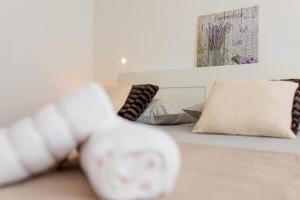 Postel nebo postele na pokoji v ubytování Apartment Soni A4