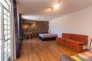 Postelja oz. postelje v sobi nastanitve Flat funcional, com Wi-Fi e otima localizacao