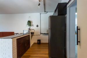 Kuhinja oz. manjša kuhinja v nastanitvi Flat funcional, com Wi-Fi e otima localizacao