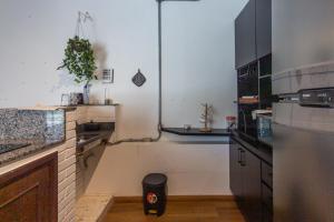 Kuhinja oz. manjša kuhinja v nastanitvi Flat funcional, com Wi-Fi e otima localizacao