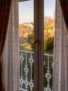 a view of a balcony from a window at Ferienwohnung am Hochblauen in Badenweiler