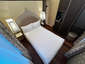 Posteľ alebo postele v izbe v ubytovaní Albergo San Marco