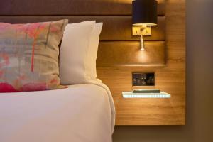 Voodi või voodid majutusasutuse Moxy Dublin City toas