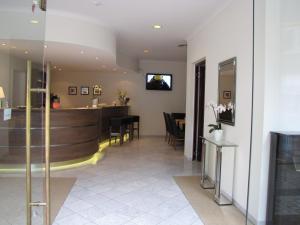 
The lobby or reception area at Arcade Hotel
