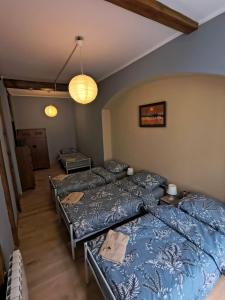 Posteľ alebo postele v izbe v ubytovaní Wrocławska 1