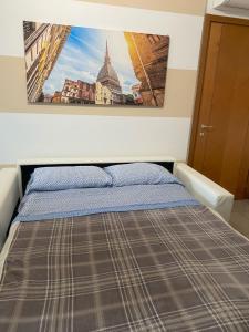 Postel nebo postele na pokoji v ubytování Relax Preserasca-Modern Apartment-BORGO MERCATO-MONCALIERI