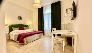 Postel nebo postele na pokoji v ubytování Castelfiore