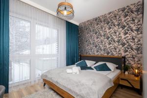 Postel nebo postele na pokoji v ubytování Apartament Ares - Beskid Apartment