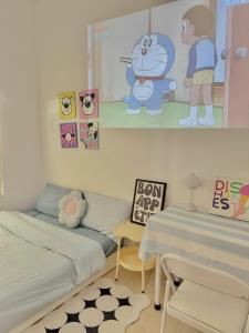 Ein Bett oder Betten in einem Zimmer der Unterkunft Jeju Homestay
