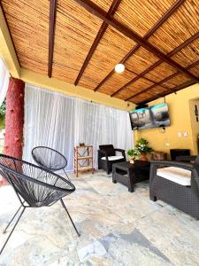 Posezení v ubytování Fm Luxury villa Arquitectura tipo Bali Mini Playa y piscina privada