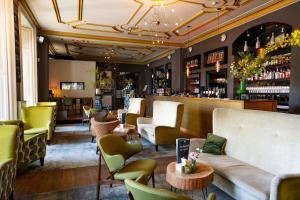 Hotel Villa Ruimzicht tesisinde lounge veya bar alanı