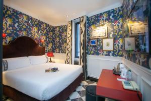 Ένα ή περισσότερα κρεβάτια σε δωμάτιο στο Casual Eclettico Milano