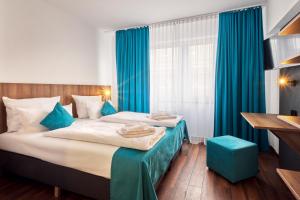 Postelja oz. postelje v sobi nastanitve Hotel Hansa Stuttgart City