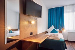 Postelja oz. postelje v sobi nastanitve Hotel Hansa Stuttgart City