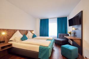 Postelja oz. postelje v sobi nastanitve Hotel Hansa Stuttgart City