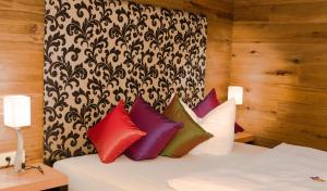 Postel nebo postele na pokoji v ubytování Hotel Post