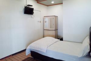 Imagen de la galería de Penginapan Ciremai Syariah RedPartner, en Apuy