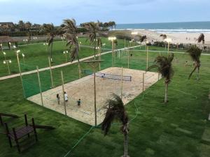 an aerial view of a playground with palm trees and the beach at Beach Living, Frente mar, Vizinho B Park - Oficial in Mangabeira