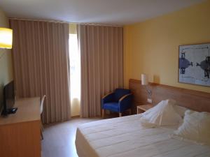Postel nebo postele na pokoji v ubytování Flag Hotel Valencia - Florazar