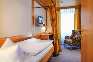 TV a/nebo společenská místnost v ubytování Hotel Post