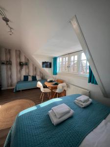 Postel nebo postele na pokoji v ubytování Bed & Breakfast Hotel Zandvoort