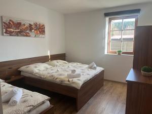 Cama o camas de una habitación en Apartmány Lipka