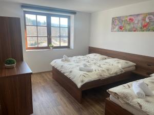 Cama o camas de una habitación en Apartmány Lipka