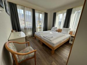 Postel nebo postele na pokoji v ubytování HOTEL CHRISTINA