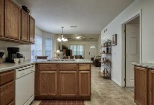a kitchen with a sink and a counter top at Henderson's Riverside in Pigeon Forge