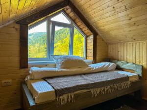 Una cama o camas en una habitación de Готель ЙомоЙо