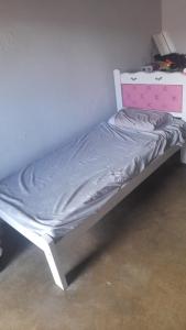 Katil atau katil-katil dalam bilik di Apartamento Para o Carnaval