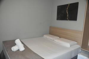 Voodi või voodid majutusasutuse Unity Hotel - Campinas toas