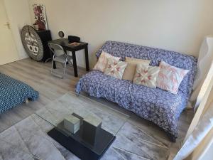 Zona de estar de Cosy Studio Close Eiffel Tower