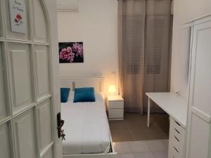 A bed or beds in a room at Central Rooms Best Vacation Ever