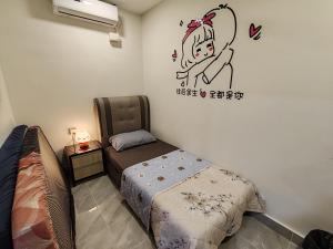 Postel nebo postele na pokoji v ubytování Loveu homestay 5 Blossom