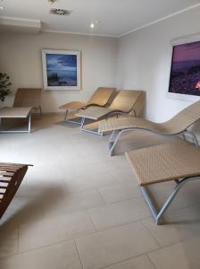 Ein Sitzbereich in der Unterkunft Haus Meeresblick - Ferienwohnung Am Strand (Ref. 128682u2)