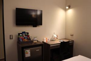 TV a/nebo společenská místnost v ubytování Rado Hotel - Santa María