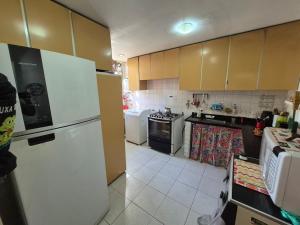 Kuchyň nebo kuchyňský kout v ubytování SUH Botafogo 06 Family Spacious