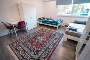 Postel nebo postele na pokoji v ubytování Monteursunterkunft