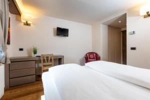 TV a/nebo společenská místnost v ubytování Hotel Cardo