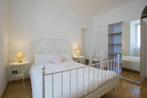 Posteľ alebo postele v izbe v ubytovaní Residence alle Ville