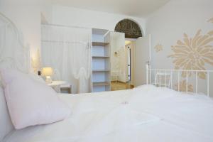 Posteľ alebo postele v izbe v ubytovaní Residence alle Ville